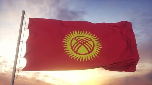 Waving Kyrgyzstan Flag Against Sunset Sky