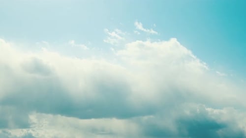 Cloudy Sky With Fluffy Clouds. Natural Background