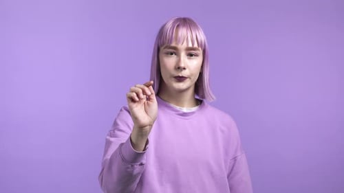 Young Unusual Woman Using Touchscreen of Smartphone or Tablet