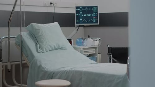 Nobody in Hospital Ward Bed with Medical Equipment