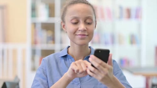 Young Woman Uses Smart Phone, Close Up