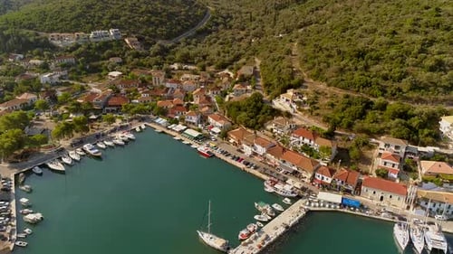 Aerial view above of harbor on the coast of mediterranean sea, Greece.