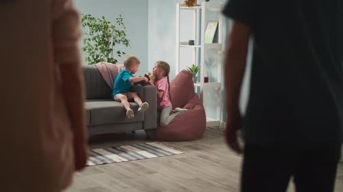 Children Embrace Tenderly at Home