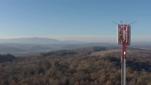 Telecommunication tower and endless valley 4K drone video