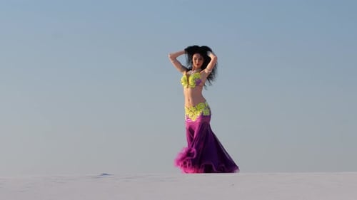 Woman Dancing in a Desert Landscape