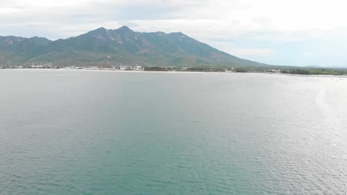 Drone Shot of a Mountain Against the Background of the Sea and Small Fishing Corals. Wildlife