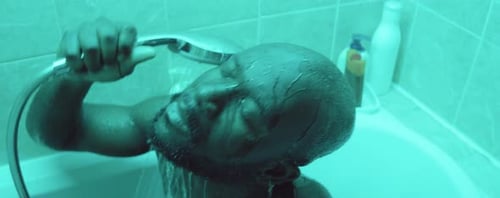 Black Man Taking Shower