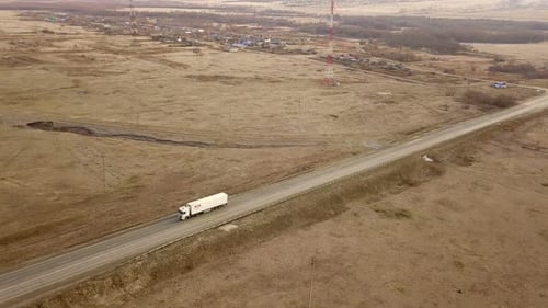 Aerial View of Semi-Truck on Rural Highway