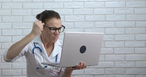 Angry Doctor with Computer