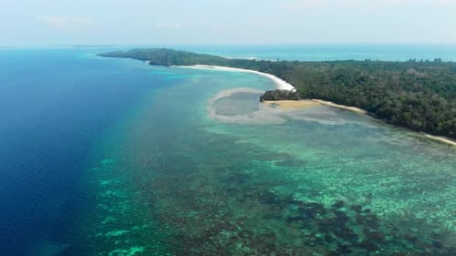 Aerial: flying over tropical beach island coral reef turquoise caribbean sea