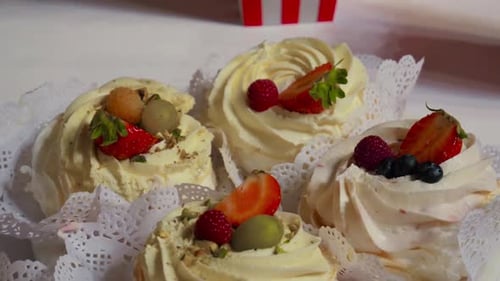 Delicious Pavlova Cakes with Fresh Berries