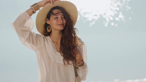 Woman Resting on the Beach During Vacation