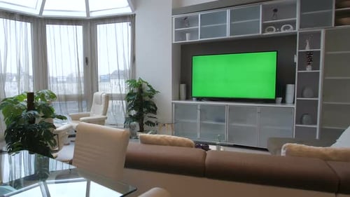 Modern Living Room Interior with Green Screen TV