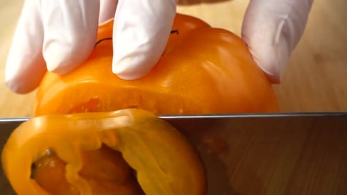 The Cook Cuts the Tomato 2