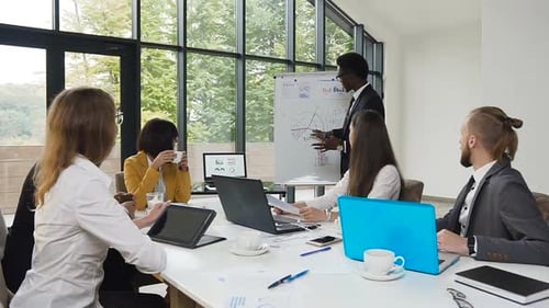 Business Team Meeting in Modern Office Space