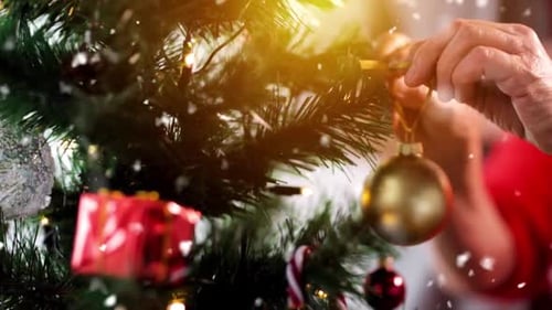 Decorating Christmas Tree with Festive Baubles at Home