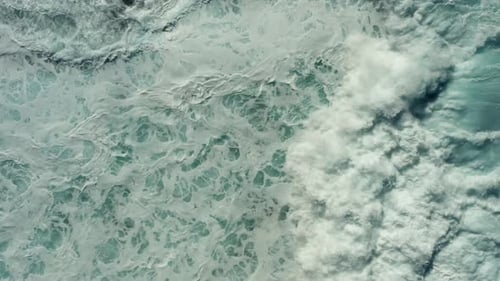 A Spectacular Aerial View of the Sea Foam From a Powerful Tidal Wave