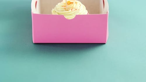 Cupcake with happy mother day card against green background