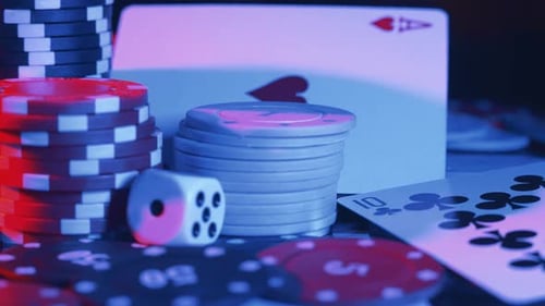 Casino Chips and Playing Cards in Motion