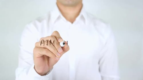 Man Writes 'Aim High and Create Action'