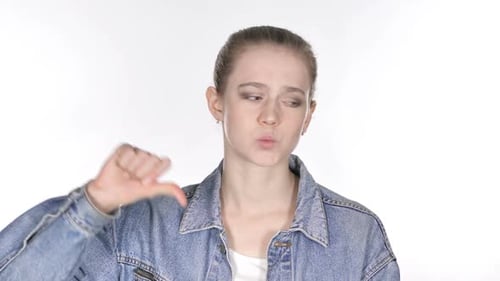Young Adult Woman Giving Thumbs Down Gesture