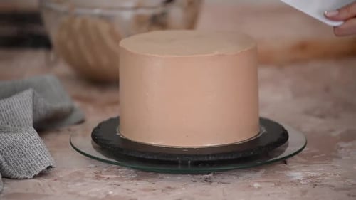 Close Up of Woman Hands Making Sweet Cake with Chocolate Cream and Biscuit