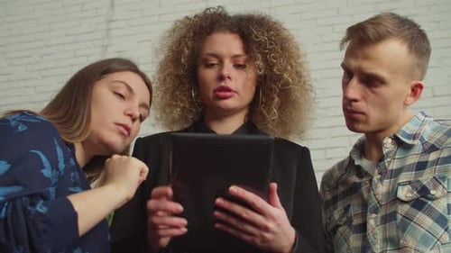 Team Discusses Plans on Tablet Device