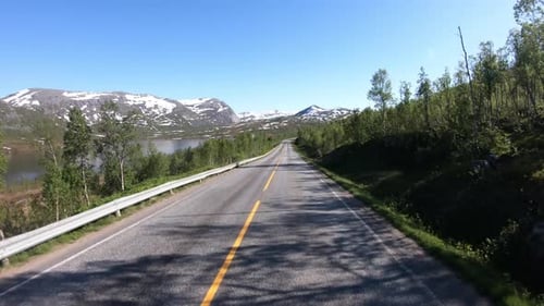 Vehicle Pointofview Driving a Car on a Road in Norway