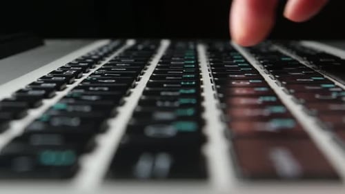 Hands of an Office Worker Typing on Keyboard, Close Up, Side View, Black