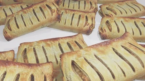 3D Rotating Golden Baked Pastries Animation