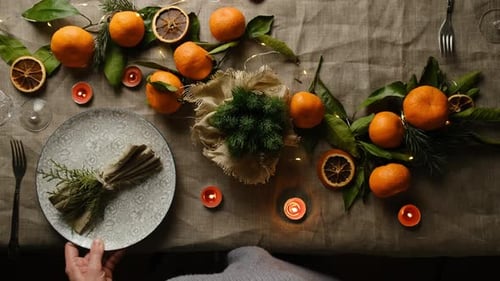 Festive Holiday Table Setting with Fruit and Candles
