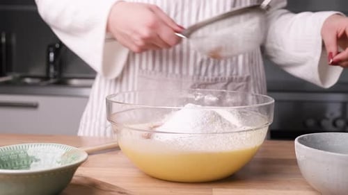 Sieving Flour in the Bowl to Bake