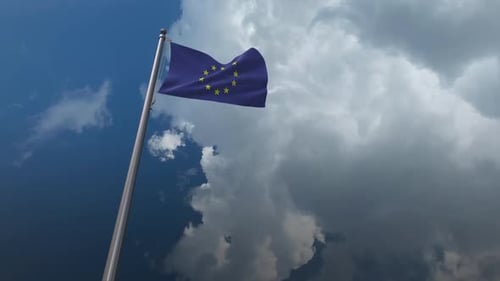 European Union Flag Waving in Cloudy Sky