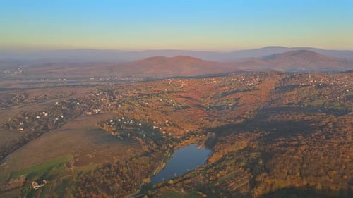 Aerial View Awesome Evening Sunset in Below Panorama Valley on Lake with Mountains