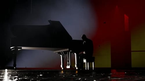 Dramatic Silhouette of Musician Playing Piano in Rain