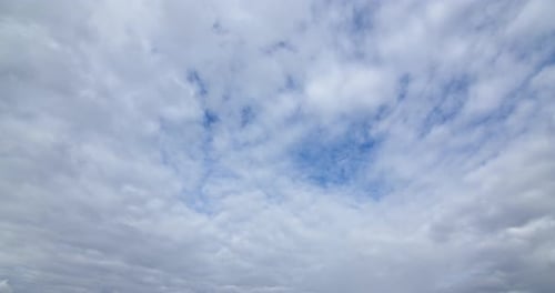Clouds Move Across Vivid Blue Sky