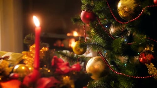 Cozy Christmas Decorations with Glowing Candle and Tree