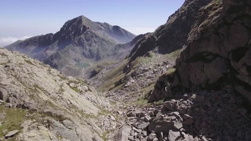 Italy Alps Mountains Aerial Above Blue Lake Reveal in Summer Sunny Day