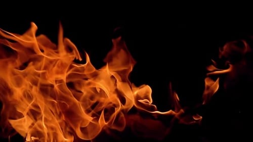Abstract Flames Glowing on a Black Background