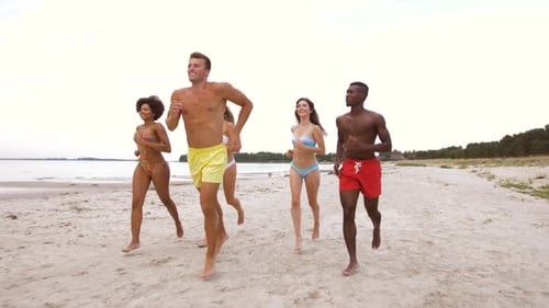 Happy Friends Running on Summer Beach 30