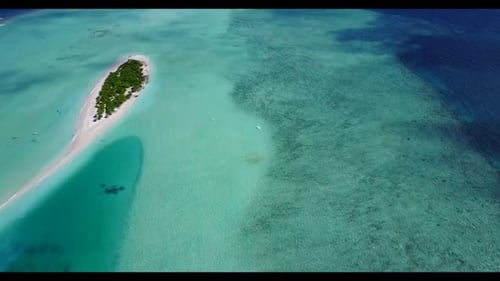 Aerial top view travel of relaxing lagoon beach journey by shallow ocean and white sand background o