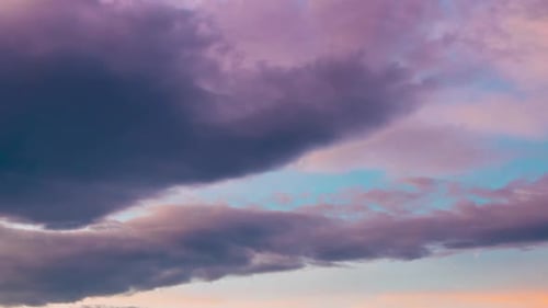 Dramatic Clouds Time-Lapse at Colorful Sunrise