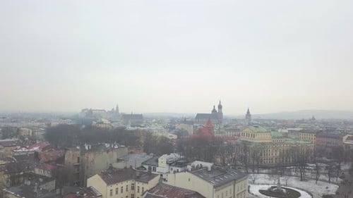 AERIAL: Krakow, Poland Old Town in Winter Snow