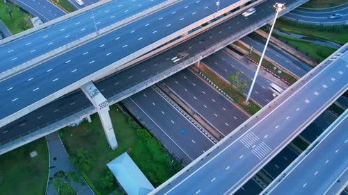 4K : Aerial Hyper lapse drone view of road junction with moving cars.