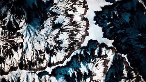 Aerial View of Snow Mountain Range Landscape
