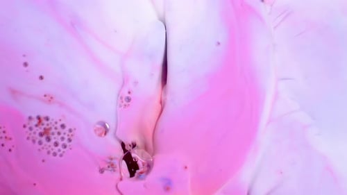 Slow Motion of Bright Colored Bubbles.