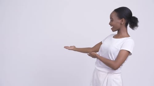 Smiling Woman Presenting to the Left