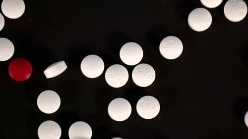 Pills Falling in Slow Motion