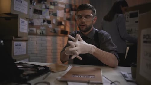 Attractive Forensic Expert Working With Physical Evidence at Police Department