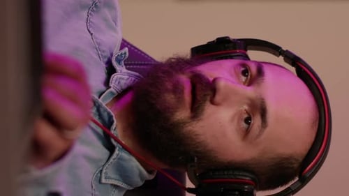 Man wearing headphones indoors